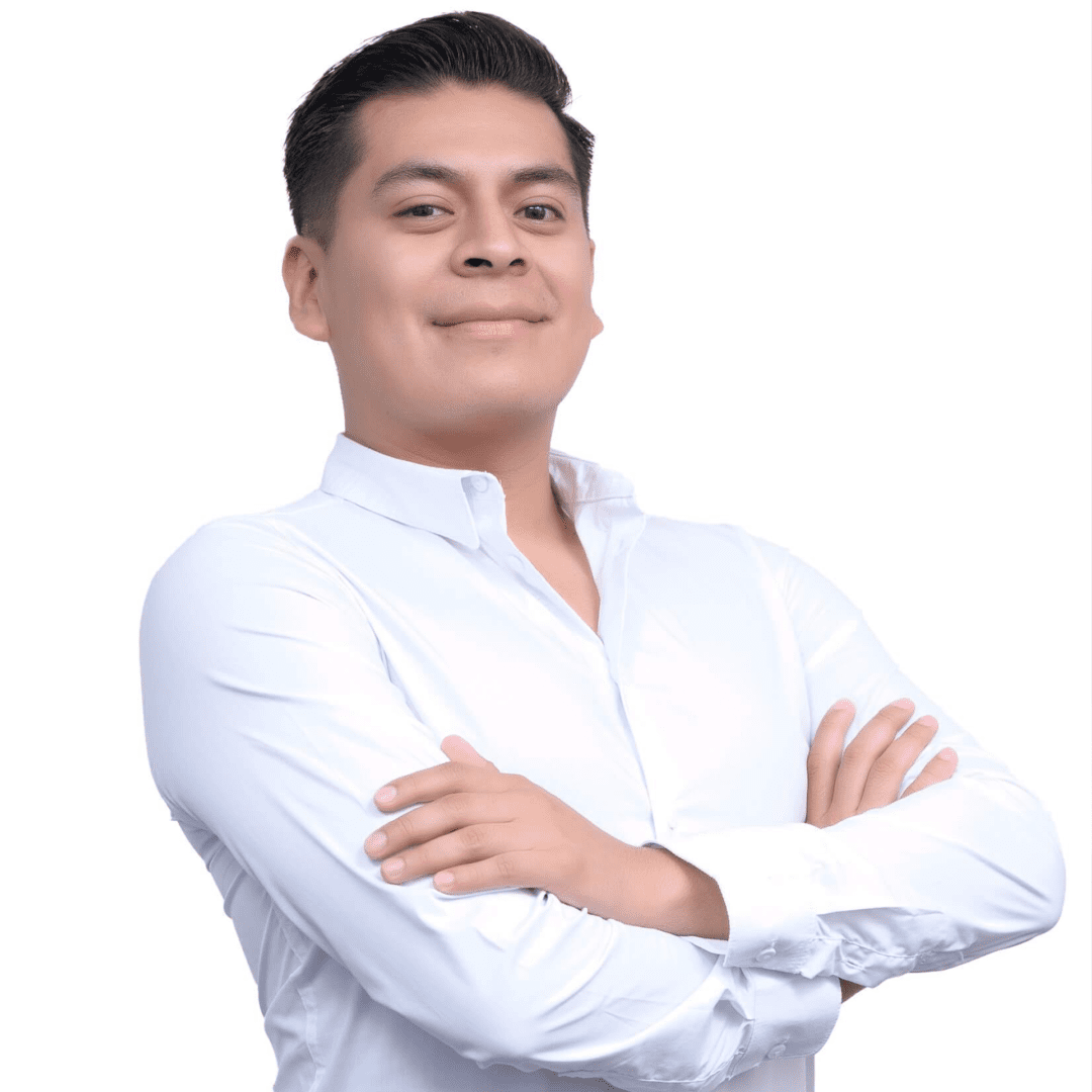 A man in a white shirt posing for a photo.